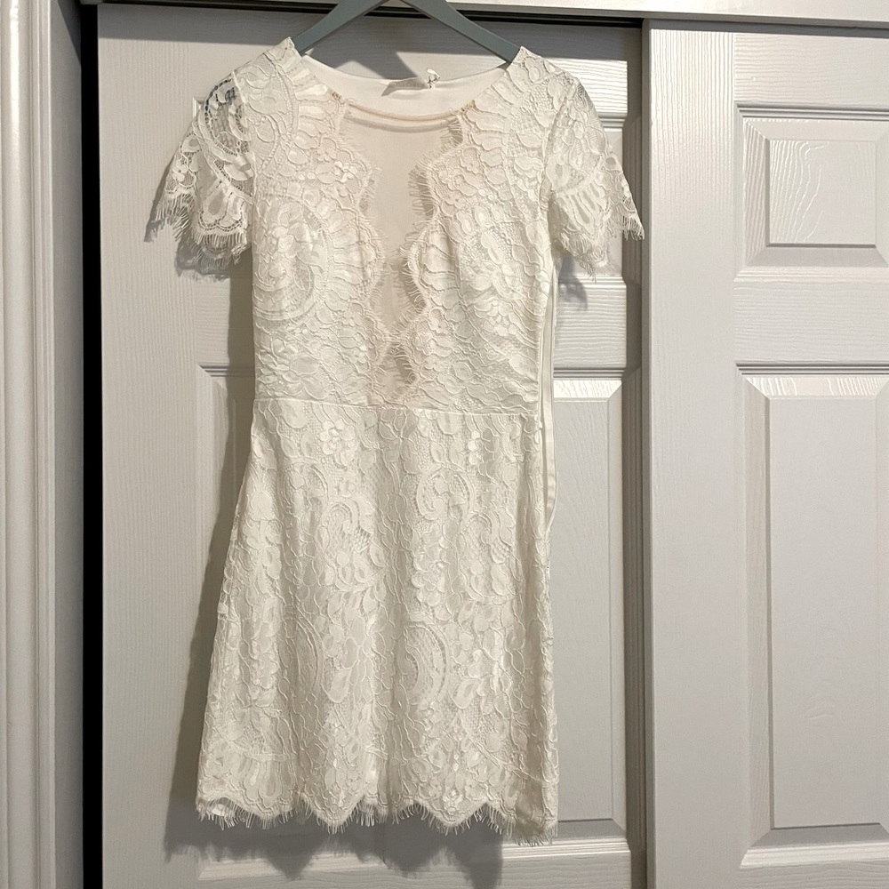 Lulu’s White Laced Mini Dress.